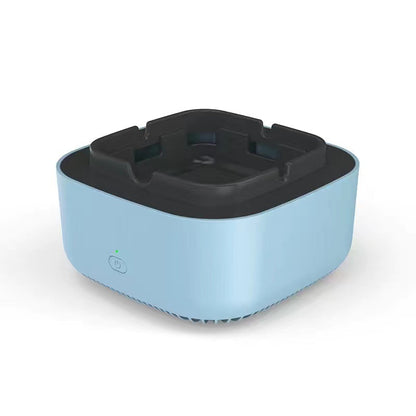 Cenicero purificador de aire CleanSmoKe con luz encendida sobre una mesa